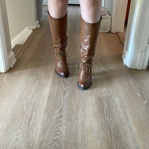 Distressed leather heeled boots.